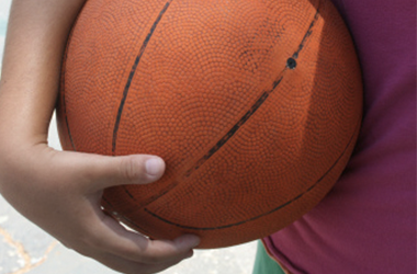 boy holding basketball